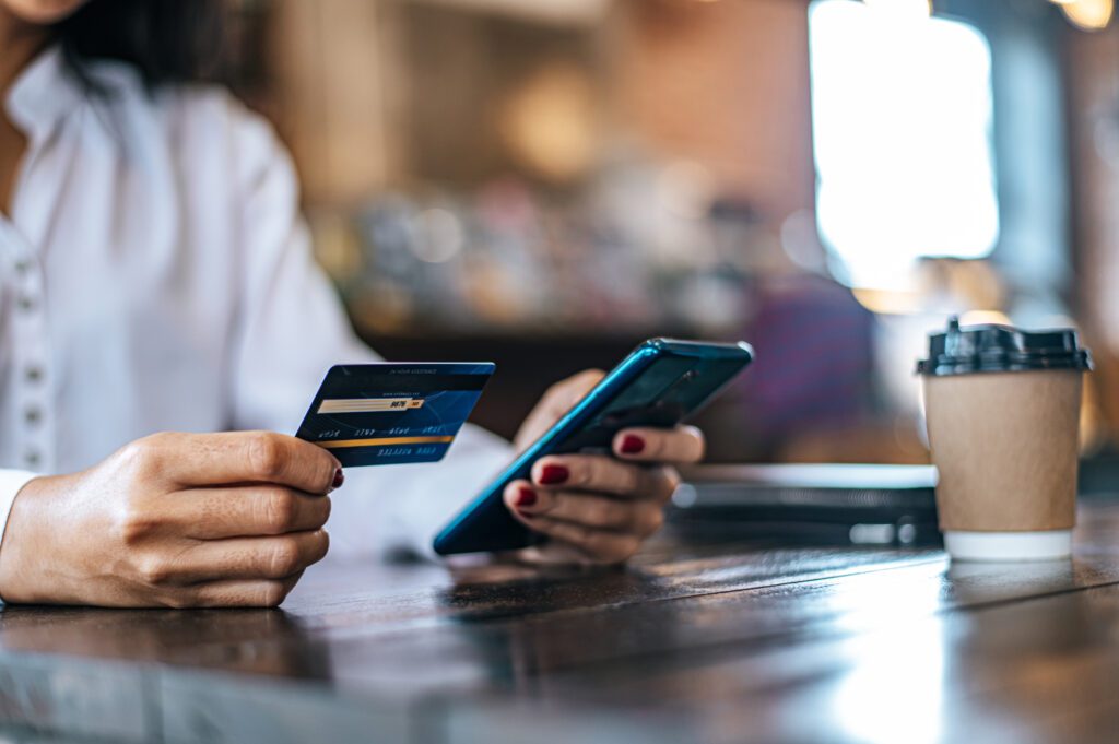 Pay for goods by credit card through a smartphone